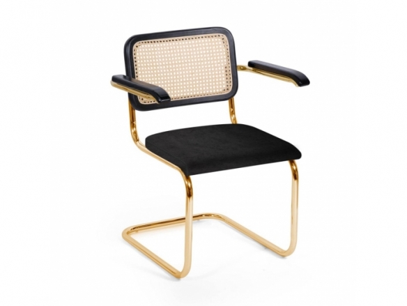 Sillón negro con patas doradas y ratán natural  merkamueble