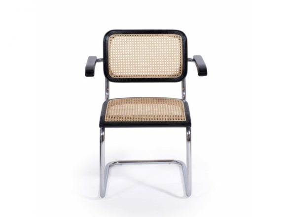Sillón negro con ratán natural y acero cromado  merkamueble