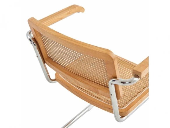 Sillón símil ratán y madera con brazos  merkamueble