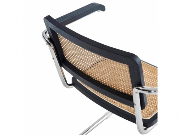 Sillón recto símil ratán madera negra y patas plateadas  merkamueble