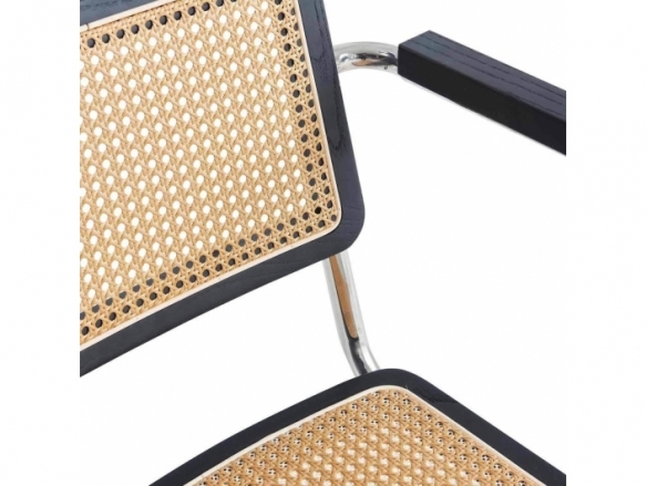 Sillón recto símil ratán madera negra y patas plateadas  merkamueble