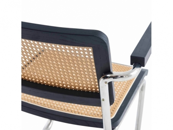 Sillón recto símil ratán madera negra y patas plateadas  merkamueble